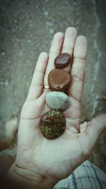 Close-up of hand holding text