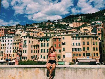 Woman standing in a city