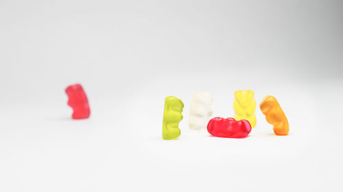 Close-up of red buttons on white background