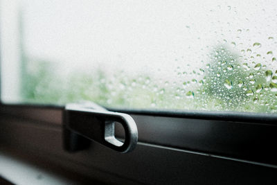 Close-up of wet car window