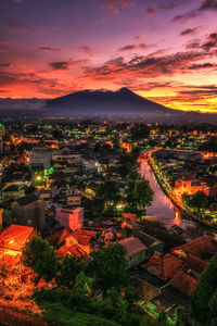 High angle view of townscape against sky during sunset