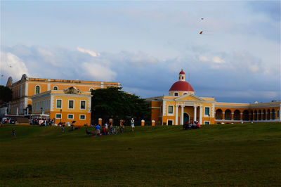 People in front of historical building