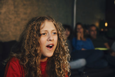 Portrait of teenage girl looking away