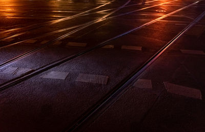 High angle view of railroad tracks at night