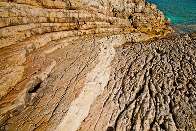 Detail of rock surface washed by the sea for ages. coast line of losinj island, croatia.