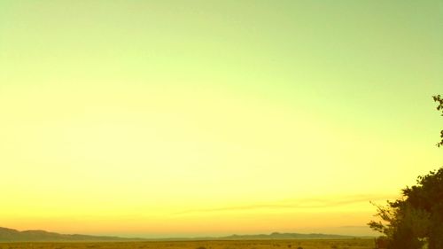 Scenic view of silhouette landscape against clear sky