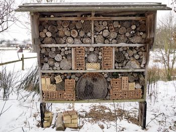 Built structure on snow covered field