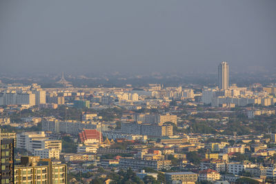 High angle view of buildings against sky in city