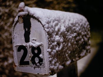 Close-up of snow covered with text