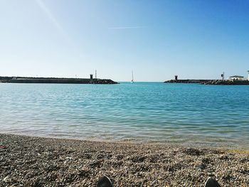 Scenic view of sea against clear sky
