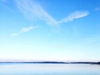 Scenic view of sea against blue sky