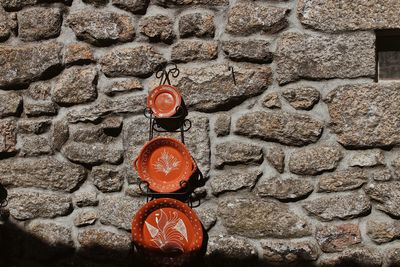 Close-up of electric lamp on wall