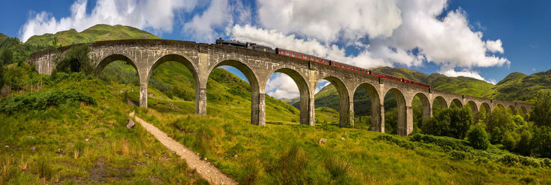 Panoramic view of arch bridge against sky