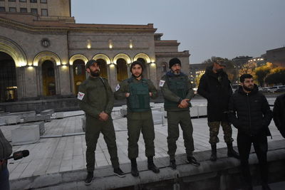 Group of people standing in front of building