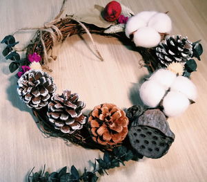 High angle view of pine cone on table