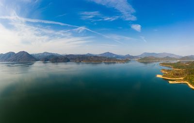 Scenic view of lake against blue sky