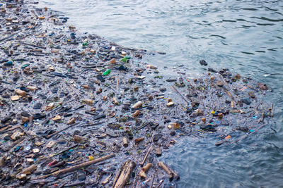 High angle view of garbage floating on sea