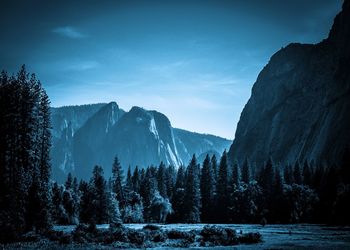 Trees and mountains at yosemite national park against sky