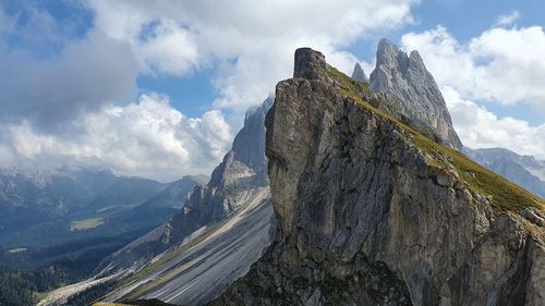 Low angle view of rock formations against sky