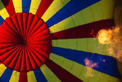 Close-up of hot air balloon flying against sky