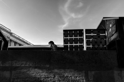 Man standing in front of building