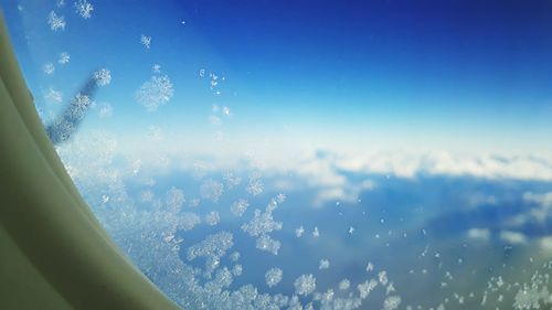 View of sky through airplane window