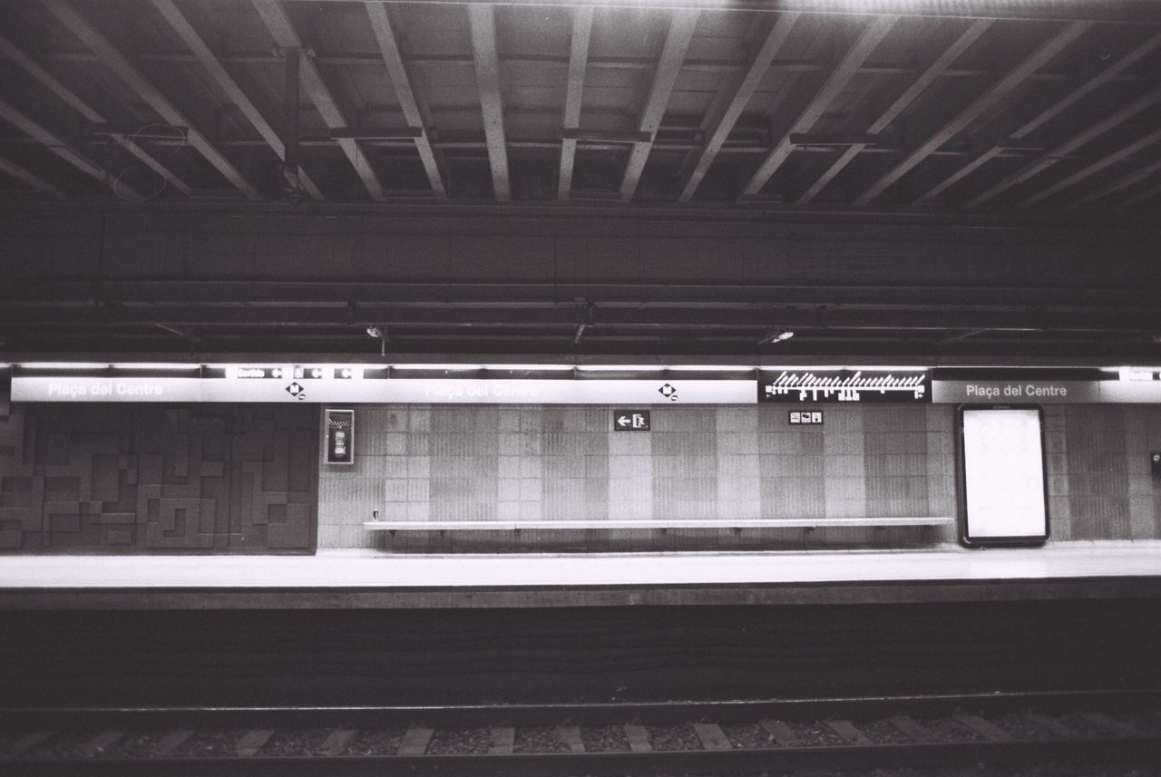 TRAIN IN RAILROAD STATION