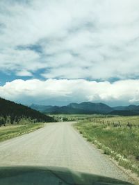 Road passing through rural landscape