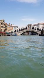 Arch bridge over river