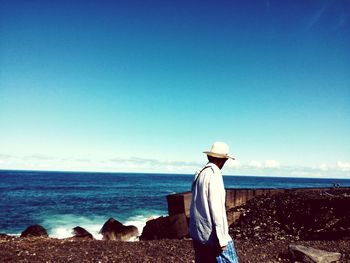 Scenic view of sea against blue sky