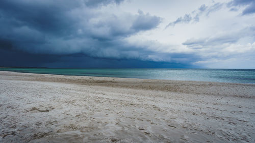 Scenic view of beach against sky