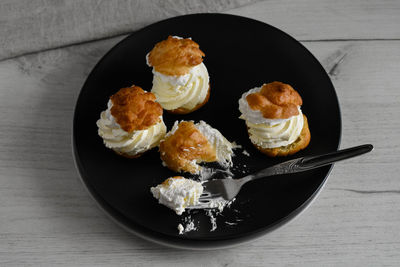 High angle view of desserts in plate on table