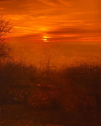 Scenic view of dramatic sky during sunset