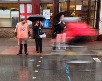 Blurred motion of woman standing in park