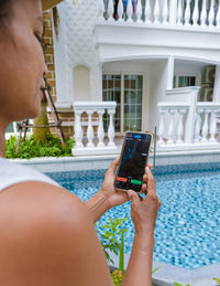 Young woman using mobile phone