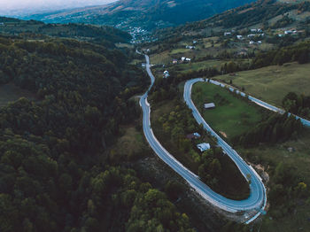 High angle view of road amidst trees