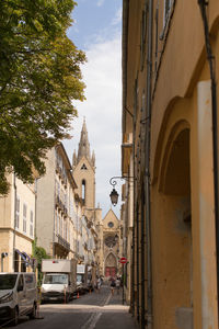 Road leading towards church in town