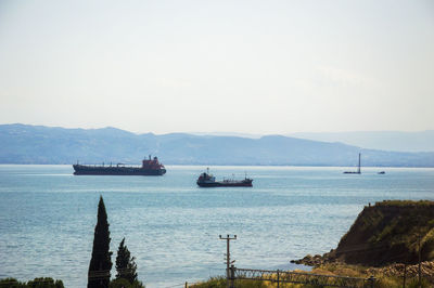 Scenic view of boats in sea