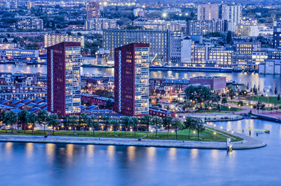 Aerial view of illuminated buildings in rotterdam at night