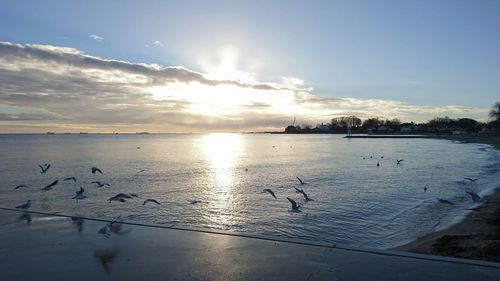 Scenic view of sunset over river