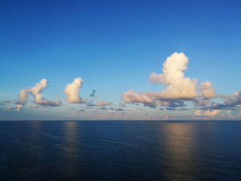 Scenic view of sea against blue sky