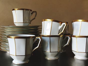 Close-up of coffee cups in kitchen