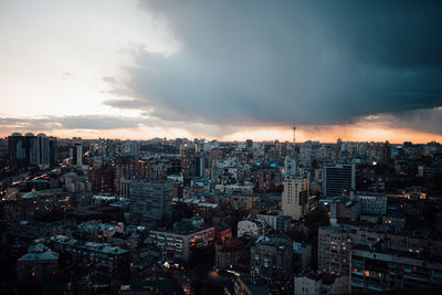 High angle view of buildings in city against sky
