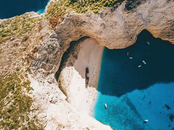 High angle view of rock formation in sea