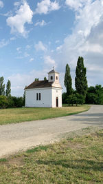 House on field against sky