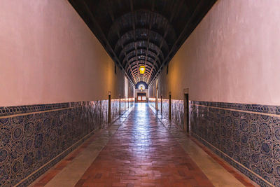 Illuminated corridor of building