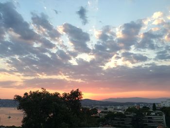 Scenic view of mountains against sky at sunset