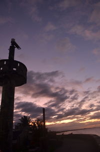 Scenic view of cloudy sky at sunset