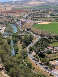 High angle view of river amidst landscape against sky