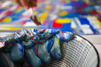 Close-up of multi colored pencils on table